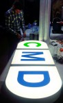 Процесс брендирования сети лабораторий "CMD" объёмные фрезерованные буквы с подсветкой диодными кластерами. Фрезерованный логотип на ресепшн. Монтаж. г.Клин.